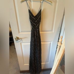 Ecote maxi dress with two slits in the front. Strapped back